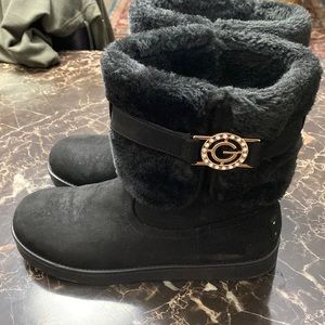 Size 8 1/2 Gently used Black Guess Faux fur lined boots